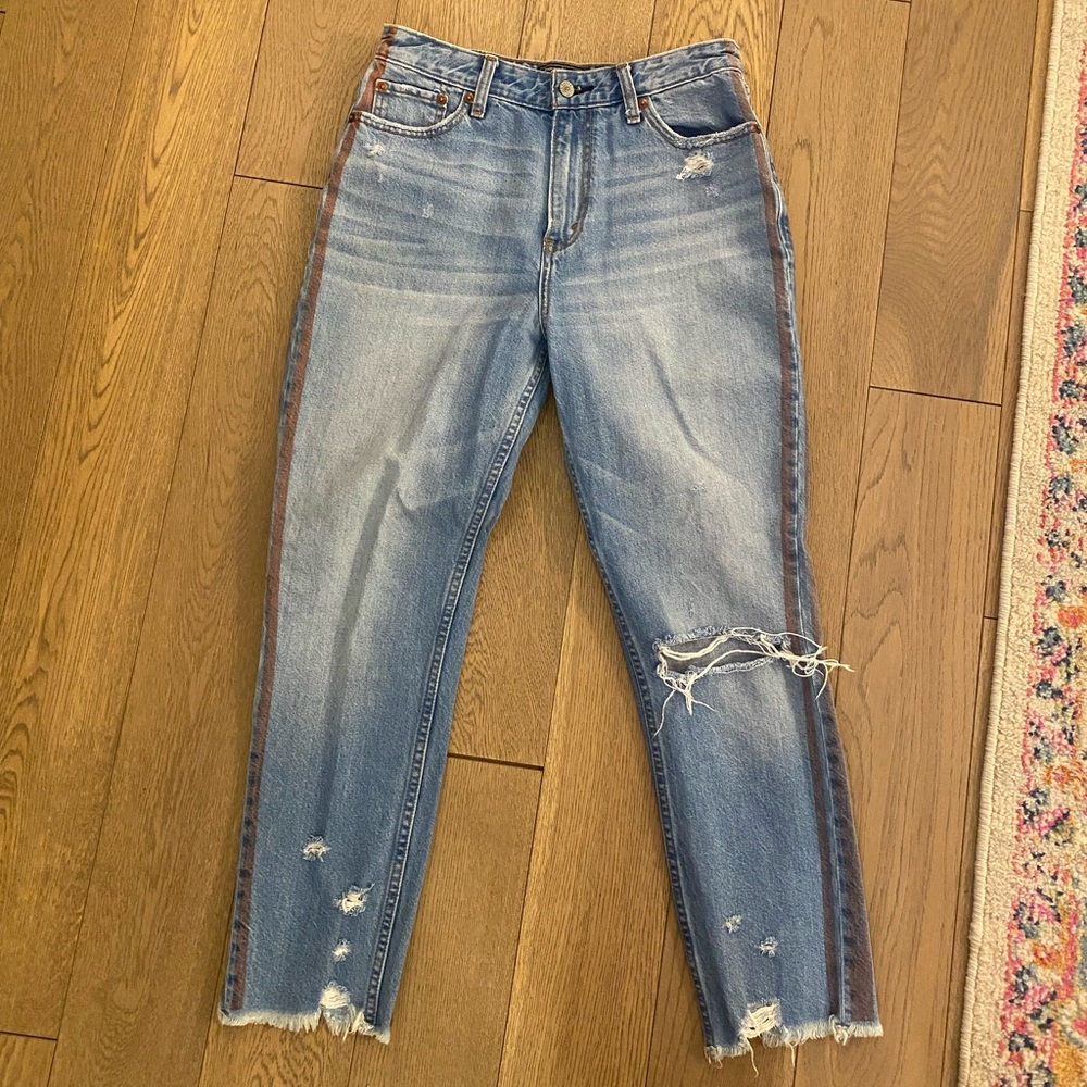 Abercrombie & Fitch light wash jeans with red stripe down side, size 27/4